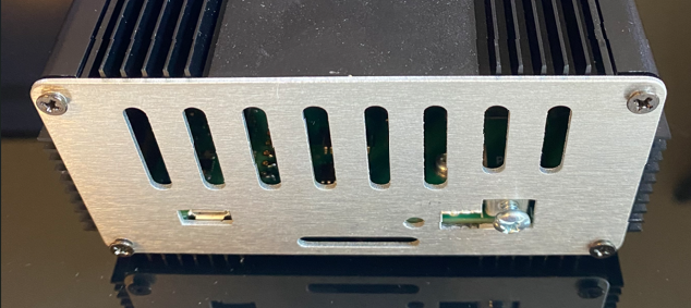 QRO20 rear panel with ventilation slots and control connectors